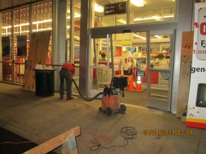 Removing glass and debris from the work site