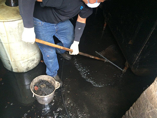 homeowner removing sewage